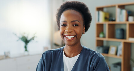 Black woman, nurse and happy face in nursing home in healthcare and volunteer with confidence in living room. African person, smile and portrait in clinic for medical support and trust of caregiver