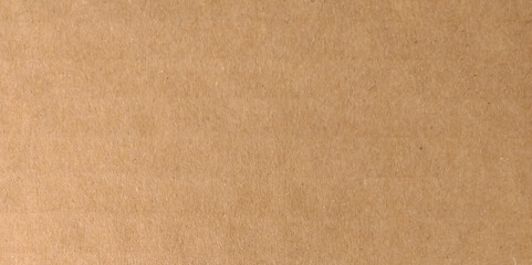 Kraft brown paper texture. Recycled cardboard. Rough textured sheet. Vintage texture