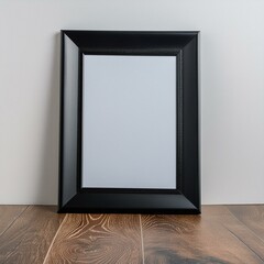 Blank Vertical black frame on wooden floor with white wall