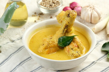 Opor Ayam, chicken cooked in coconut milk and spices from Indonesia, Popular dish for lebaran or...