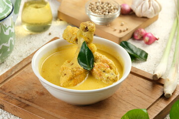 Opor Ayam, chicken cooked in coconut milk and spices from Indonesia, Popular dish for lebaran or Eid al-Fitr