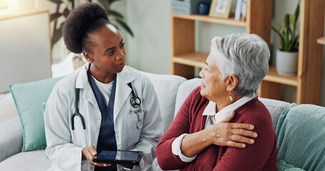 Obraz premium Senior, woman and doctor with healthcare for shoulder pain with tablet, explaining symptoms and medical advice. Elderly patient, nurse or discussion in nursing home, osteoporosis and top view on sofa