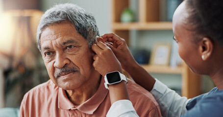 Nurse, patient and hearing aid on ear for medical support, wellness or innovation of disability....