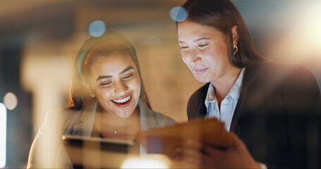 Laptop, tablet and collaboration with business people at night in the office together for teamwork....