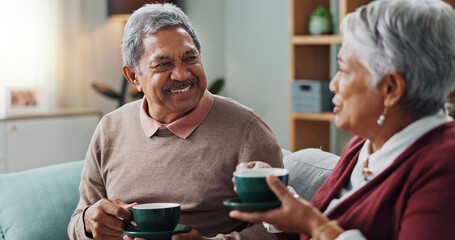 Living room, relax and elderly couple with coffee for love, bonding and funny conversation. Senior...