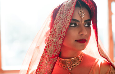 Indian, woman and fashion for wedding, veil and clothes for getting ready or bridal scarf. Female...