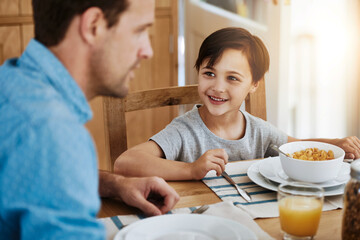 Happy, boy and dad together with breakfast on table for nutrition and eating or sharing. Hungry,...