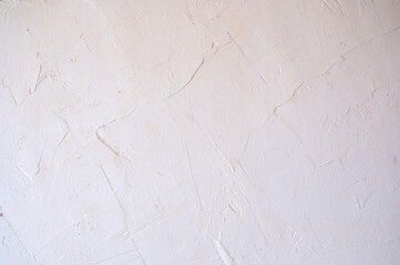 粗い表面の白い漆喰壁のテクスチャ