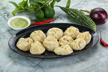Nepali steamed dumplings  Momo with sause