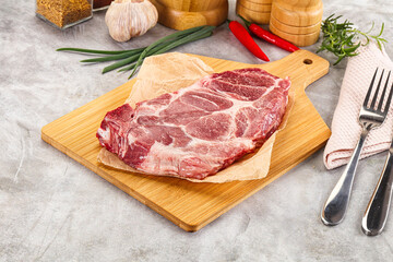 Raw pork neck steak for grill
