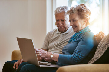 Happy senior couple, sofa and discussion with laptop for browsing, online shopping or finance at...