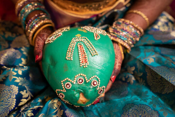 Close up of Decorated green coconut for Tamil Wedding Rituals | Traditional kobbari bondam...
