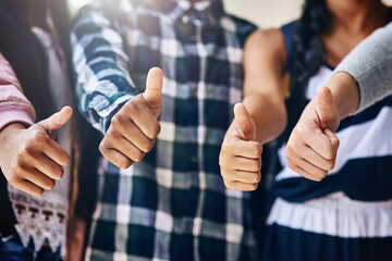 Friends, students and hands with thumbs up for review, vote or feedback in learning or education at...
