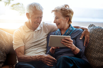 Mature couple, tablet and watch in living room, digital and online for news, information and show...
