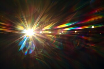 Abstract blurred colorful lens flare bokeh on black