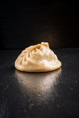 Khinkali - Georgian traditional food. black background