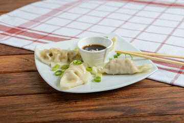 Dumplings are small, savory or sweet filled dough pockets, often boiled, steamed, or fried.