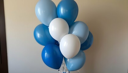 A balloon bouquet in shades of blue and white for