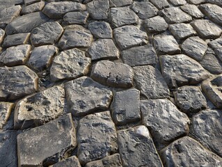 Stone pathway closeup gray and black tones. Textured ground concept