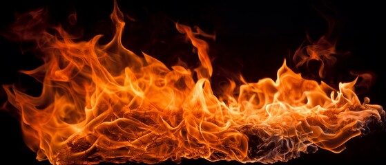 Fototapeta premium fire on a black background, burning and hot flames, close view