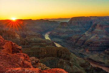 Sunset Over the Grand Canyon with River and Rock Formations