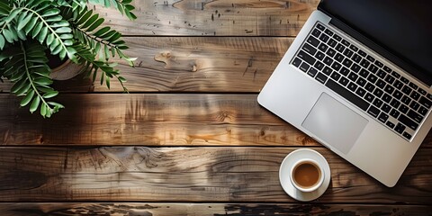 Laptop on Wooden Desk with Copy Space for Online Grant Writing and Fundraising Course