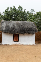 rural tribe traditional home made of twigs and mud at village at day