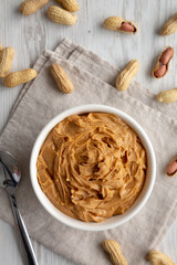 Organic Raw Peanut Butter in a Bowl, top view.