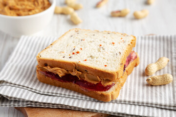 Homemade Peanut Butter and Jelly Sandwich, side view. Close-up.