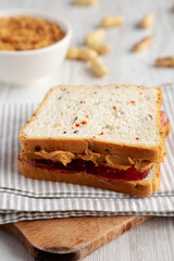 Homemade Peanut Butter and Jelly Sandwich, side view.