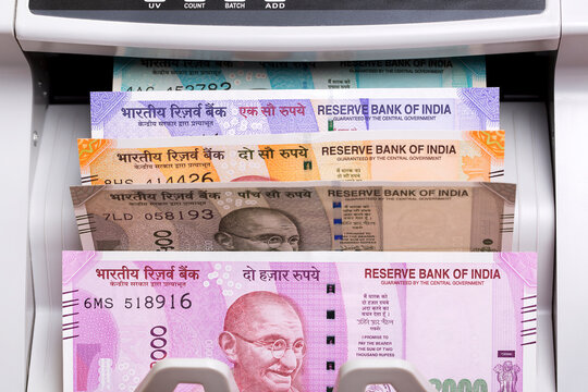 Indian rupee in a counting machine