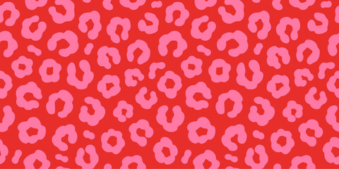 Simple pink on red leopard or cheetah skin print seamless pattern. Hand drawn vibrant red leopard print background.