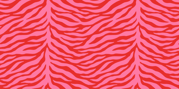 Hot pink on red tiger skin print seamless pattern. Bold hand drawn tiger stripes flat style vivid red safari background.