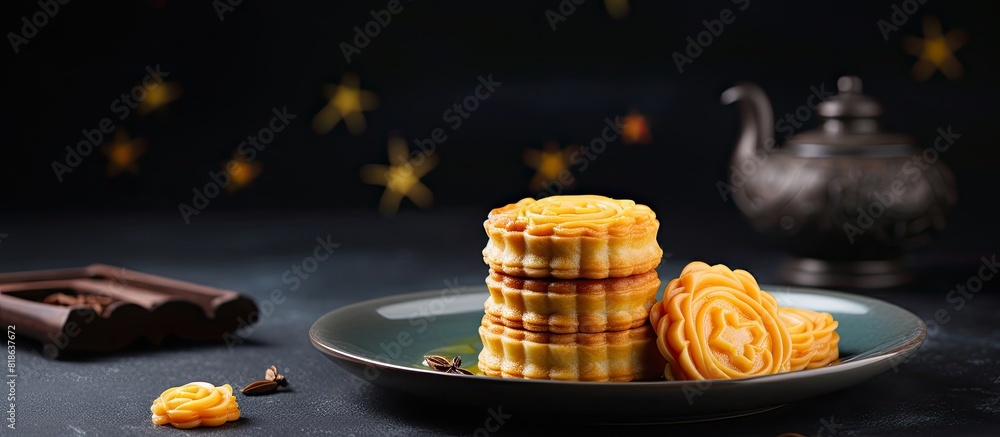 Poster Copy space image of Moon cake yolk pastry displayed on a dark gray table background to symbolize the Mid Autumn Festival holiday