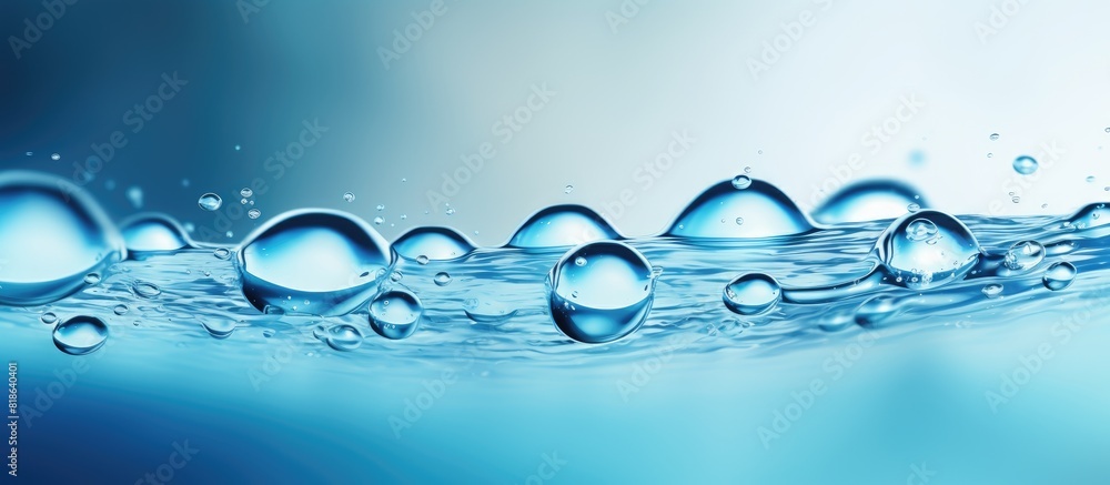 Poster a refreshing image of clear blue water droplets. creative banner. copyspace image