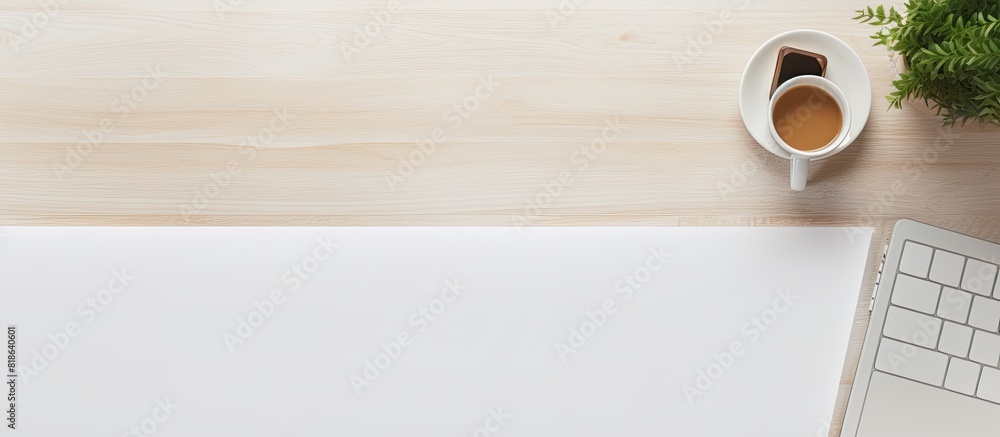 Leinwandbilder a top down view of a white office desk with a laptop rope and smartphone providing ample copy space 
