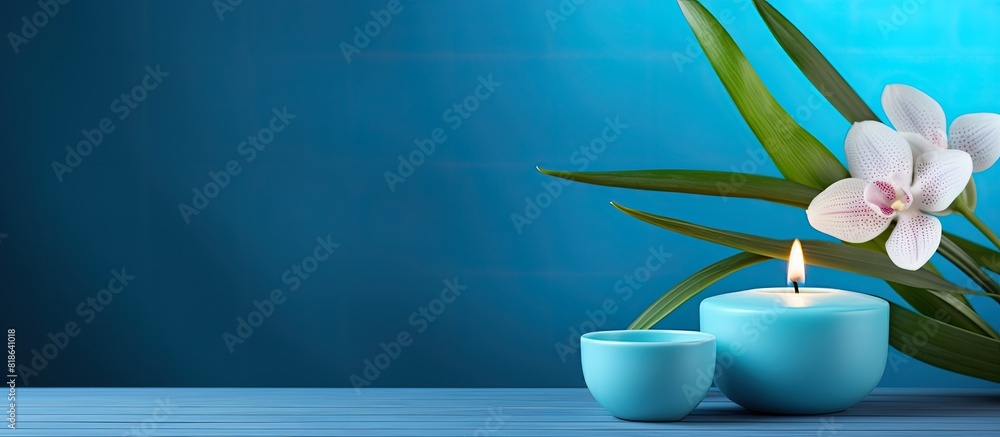 Poster spa a serene setting with a flickering candle and a small blue ceramic perfect for relaxation and tr