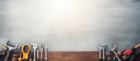 Copy space image of car repair tools arranged on a light background