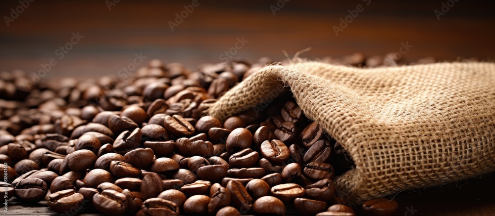 Aufkleber coffee beans on a burlap sack with copy space image
