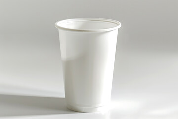 White plastic cup on an empty surface for mockup. Paper cup, coffee cup, disposable cup,  and paper mug without lid in isolated background. Suitable for branding, and advertising. AI generated