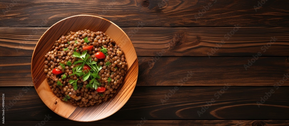 Poster an appetizing lentil dish elegantly arranged on a wooden table ready for a copy space image