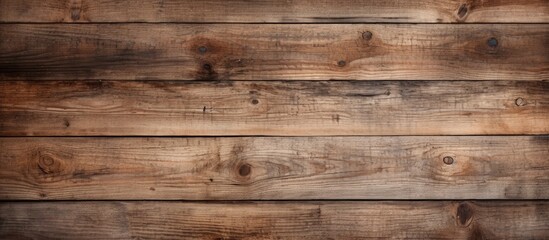 Fototapeta premium A textured background of aged wooden surfaces in a natural environment with ample space for adding images