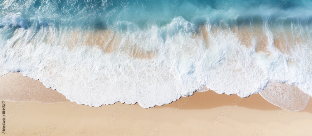Aufkleber a picturesque view of a sandy beach from above featuring light blue translucent waves and sun rays t