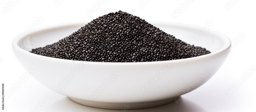 Poster Close up image of a bowl containing whole grain black quinoa isolated on a white background with ample copy space