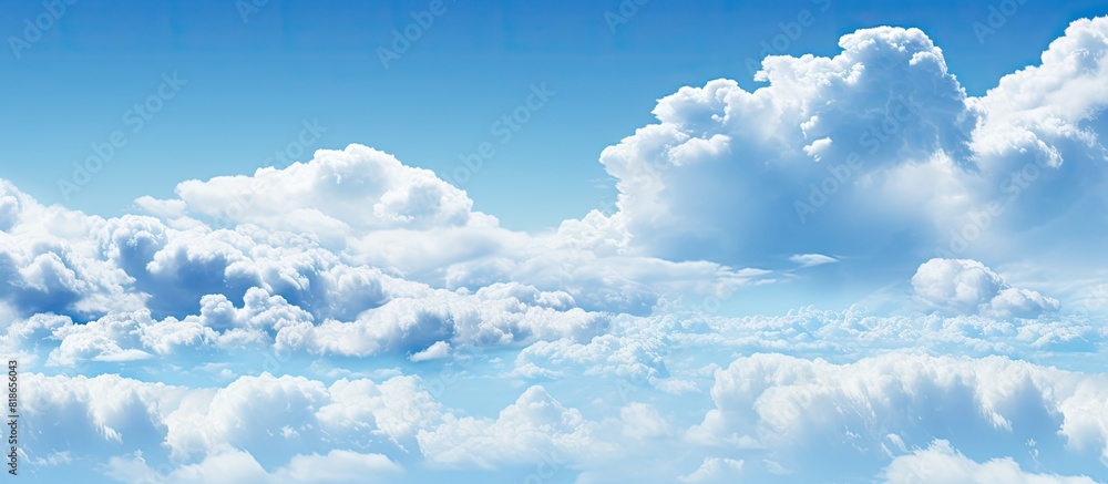 Poster the image captures a panoramic view of the expansive blue sky with scattered fluffy clouds copy spac