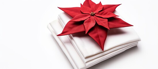 A copy space image of Christmas napkins which are paper napkins placed separately on a white background