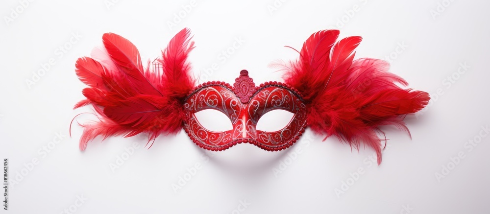 Poster a masquerade mask adorned with vibrant red feathers stands out against a clean white background leav