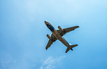 Boeing commercial airplane flying in the sky