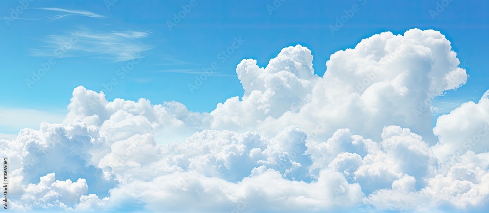 Poster view of blue sky with cloudscape providing ample copy space for images