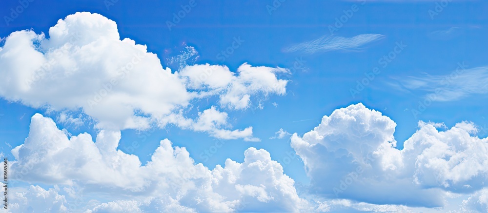 Aufkleber clear sky with white clouds providing a serene backdrop for a copy space image
